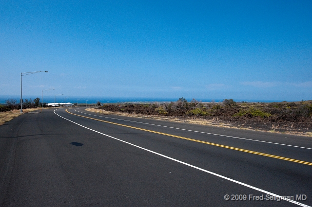 20091101_114339 D3.jpg - Road cutting through volcano remnants, Kona, Hawaii (Big Island.  Hualalai Volcano last erupted 1801 when it covered what is now part of Kona Airport